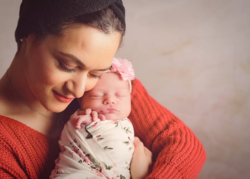 mother holding her baby